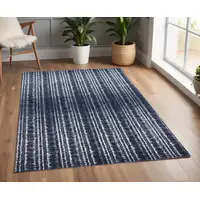 Photo of Blue Black and Ivory Power Loom Area Rug