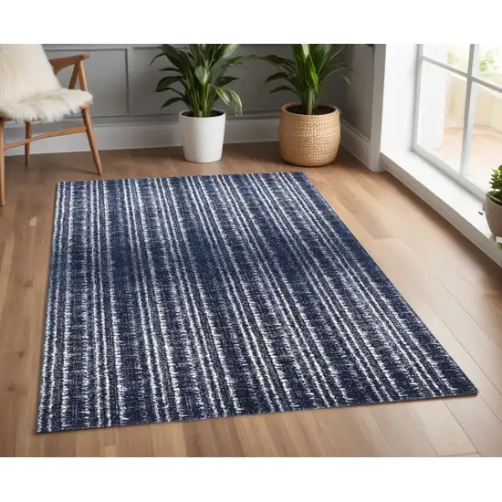 Blue Black and Ivory Power Loom Area Rug Photo 1