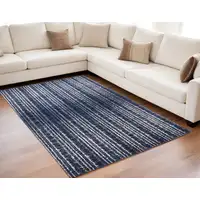 Photo of Blue Black and Ivory Power Loom Area Rug