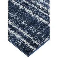 Photo of Blue Black and Ivory Power Loom Area Rug