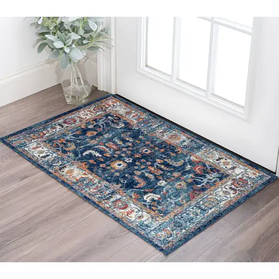 Blue Rust and Orange Floral Power Loom Area Rug Photo 1