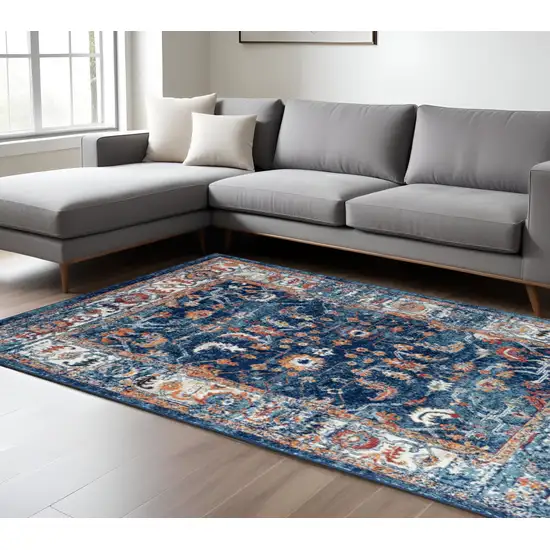 Blue Rust and Orange Floral Power Loom Area Rug Photo 1