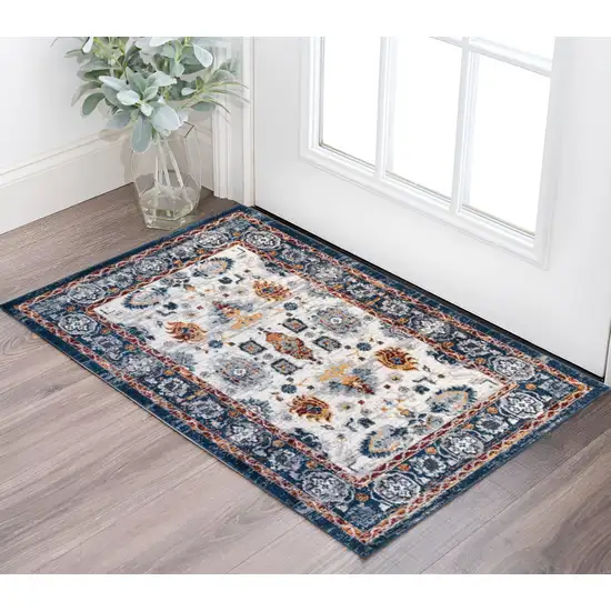 Ivory Navy and Orange Floral Power Loom Area Rug Photo 1