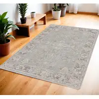 Photo of Blue Floral Power Loom Distressed Area Rug