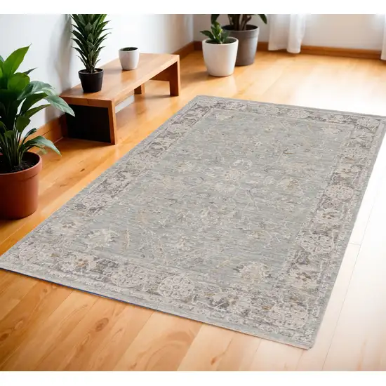 Blue Floral Power Loom Distressed Area Rug Photo 1