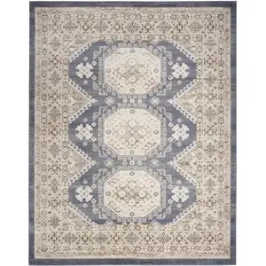 Photo of Blue Geometric Distressed Area Rug