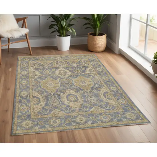 Blue and Gold Wool Floral Hand Knotted Area Rug With Fringe Photo 1