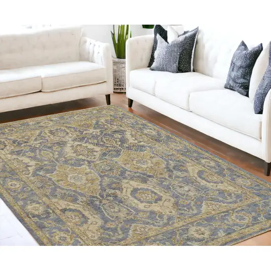 Blue Gold And Tan Wool Floral Hand Knotted Stain Resistant Area Rug With Fringe Photo 1