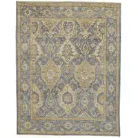 Photo of Blue Gold And Tan Wool Floral Hand Knotted Stain Resistant Area Rug With Fringe