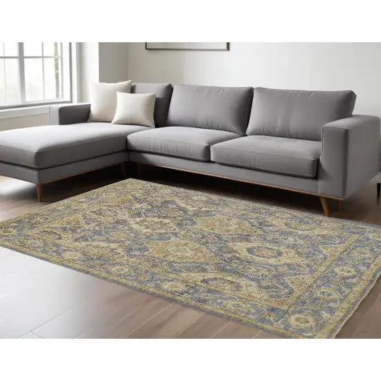 Blue Gold And Tan Wool Floral Hand Knotted Stain Resistant Area Rug With Fringe Photo 1