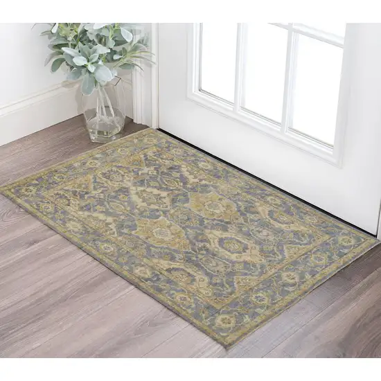 Blue and Gold Wool Floral Hand Knotted Area Rug With Fringe Photo 1