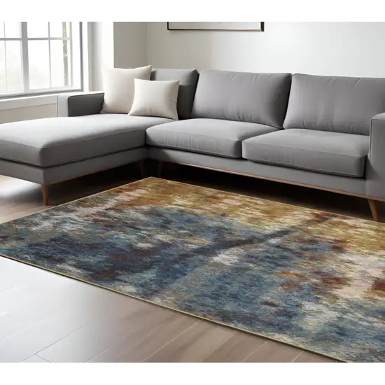 8' X 10' Blue Gold Teal Rust Grey And Beige Abstract Power Loom Stain Resistant Area Rug Photo 1