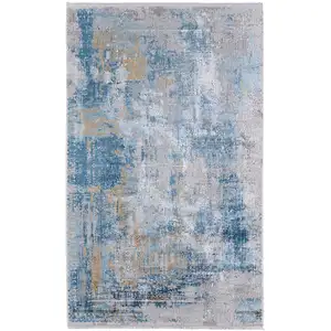 Photo of Blue Gold and Gray Abstract Power Loom Area Rug With Fringe