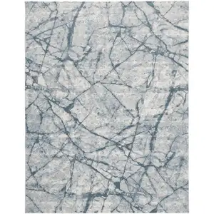 Photo of Blue Gray And Ivory Abstract Distressed Stain Resistant Area Rug