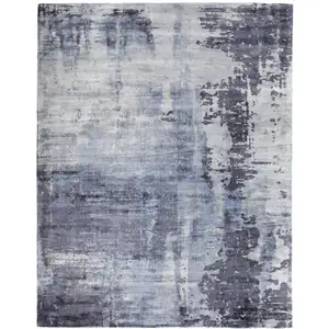 Photo of Blue Gray And Ivory Abstract Hand Woven Area Rug