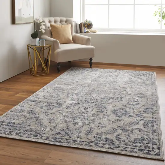 Blue Gray And Ivory Floral Power Loom Distressed Area Rug Photo 7