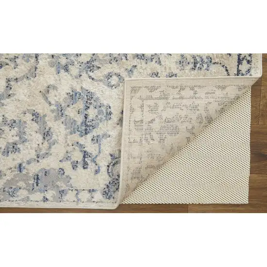 Blue Gray And Ivory Floral Power Loom Distressed Area Rug Photo 4