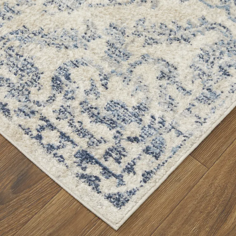 Blue Gray And Ivory Floral Power Loom Distressed Area Rug Photo 3