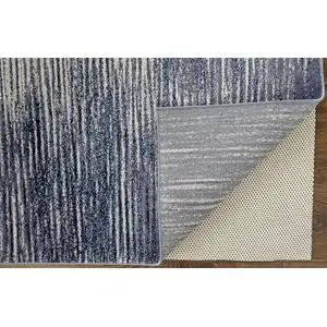 Photo of Blue Gray And Ivory Striped Power Loom Distressed Area Rug