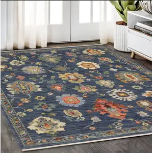 Photo of Blue Gray And Red Oriental Area Rug With Fringe