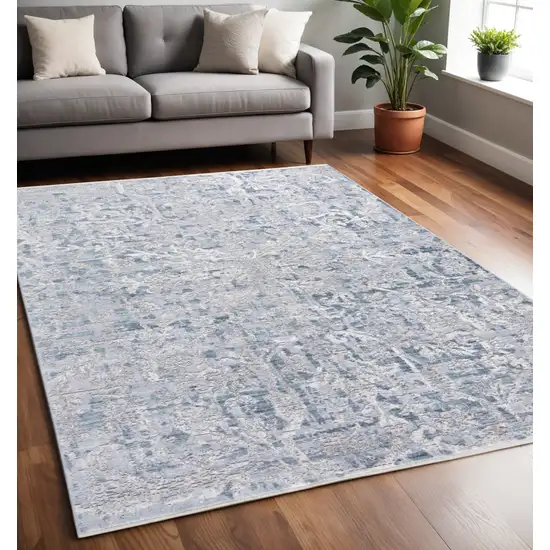 Blue and Gray Abstract Distressed Area Rug With Fringe Photo 1