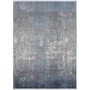 Photo of Blue Gray And Silver Abstract Power Loom Distressed Area Rug With Fringe