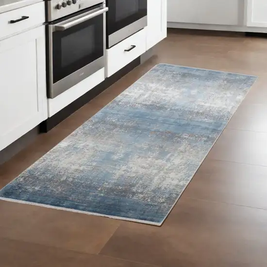 10' Blue and Gray Abstract Power Loom Distressed Runner Rug With Fringe Photo 1