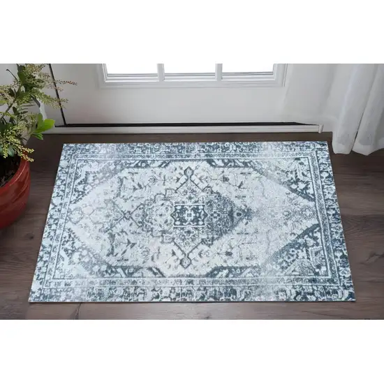 Dark Blue Gray and Ivory Oriental Distressed Washable Non Skid Area Rug With UV Protection Photo 1