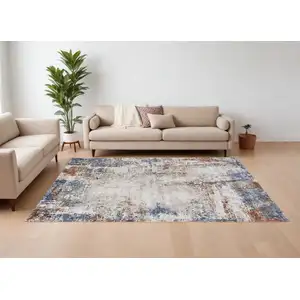 Photo of Blue Gray and Brown Abstract Power Loom Worn Faded Area Rug