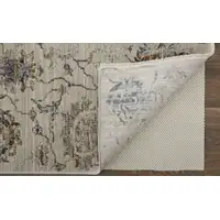 Photo of Blue Gray and Brown Floral Power Loom Worn Faded Area Rug With Fringe