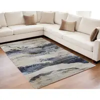 Photo of Blue Gray and Tan Abstract Power Loom Area Rug