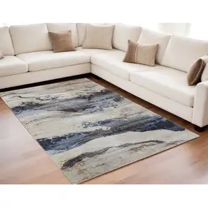 Photo of Blue Gray and Tan Abstract Power Loom Area Rug