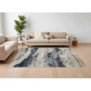 Photo of Blue Gray and Tan Abstract Power Loom Area Rug