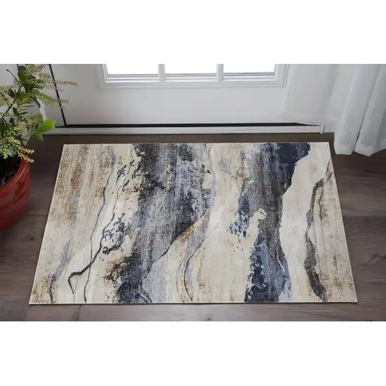 Blue Gray and Tan Abstract Power Loom Area Rug Photo 1