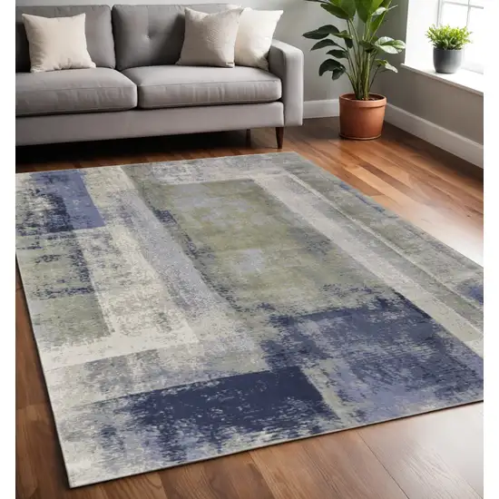 Blue and Ivory Abstract Power Loom Distressed Area Rug Photo 1