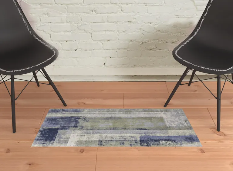 Blue Green And Ivory Abstract Power Loom Distressed Area Rug Photo 2