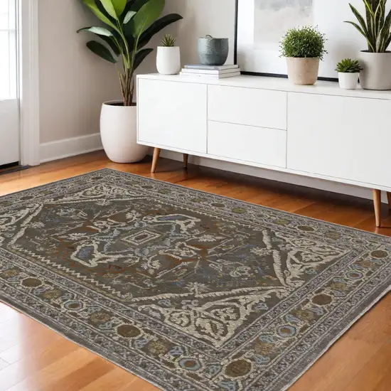 Blue Green And Ivory Medallion Area Rug Photo 1