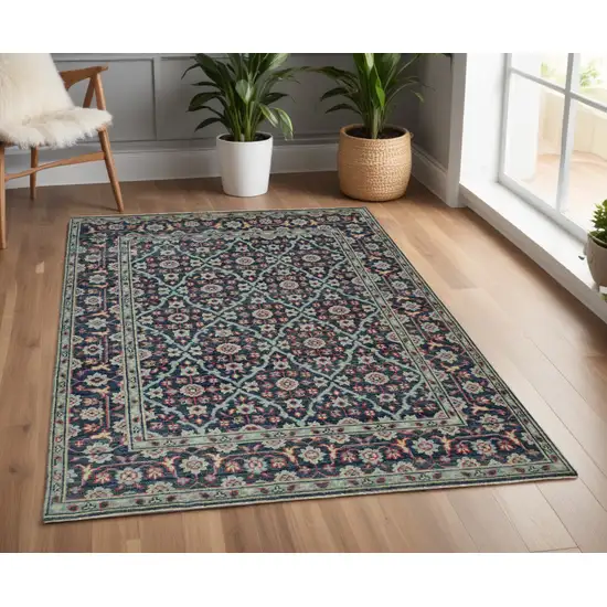 Blue and Green Wool Floral Hand Knotted Distressed Area Rug With Fringe Photo 1