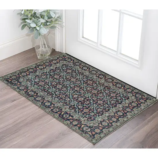 Blue and Green Wool Floral Hand Knotted Distressed Area Rug With Fringe Photo 1