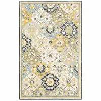 Photo of Blue Green Gold Navy And Ivory Geometric Tufted Handmade Stain Resistant Area Rug