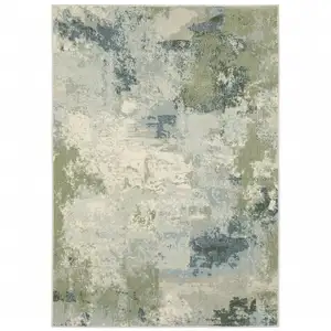 Photo of Blue Green Grey And Ivory Abstract Power Loom Stain Resistant Area Rug