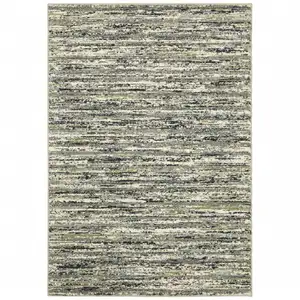 Photo of Blue Green Light Blue Grey And Ivory Abstract Power Loom Stain Resistant Area Rug