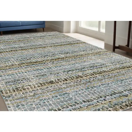 Blue and Ivory Abstract Power Loom Area Rug Photo 1