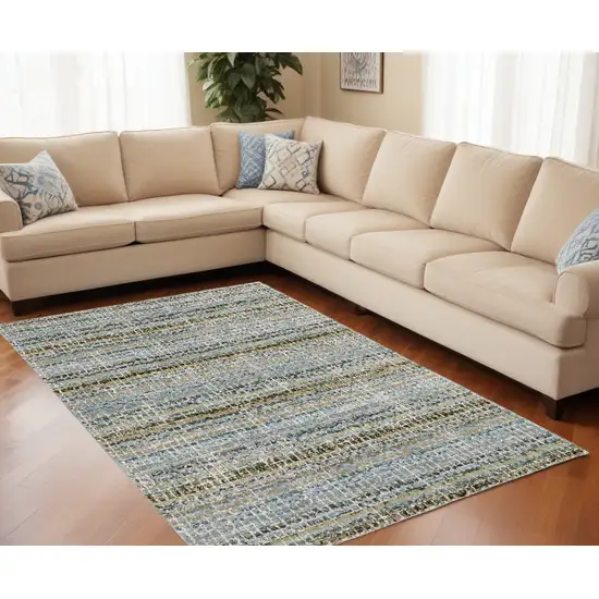 Blue and Ivory Abstract Power Loom Area Rug Photo 1