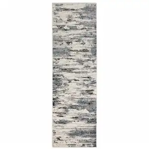 Photo of Blue Grey Beige And Brown Abstract Power Loom Stain Resistant Runner Rug