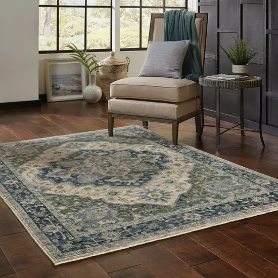 Blue Grey Beige Tan Green And Gold Oriental Power Loom Stain Resistant Area Rug With Fringe Photo 9