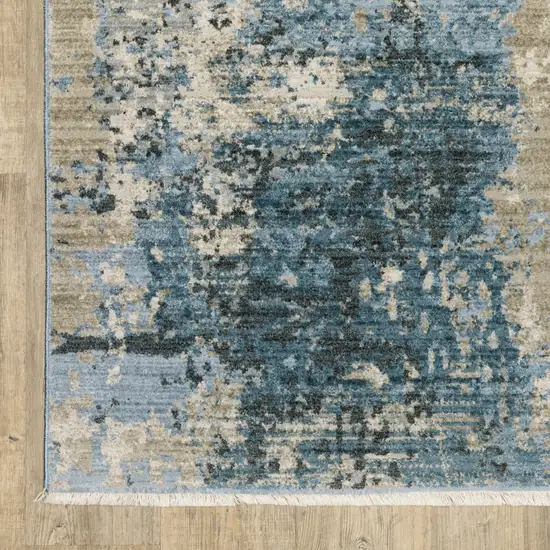 Blue Grey Ivory Light Blue And Dark Blue Abstract Power Loom Stain Resistant Area Rug With Fringe Photo 1