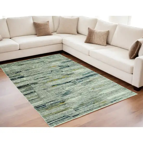 Ivory and Blue Abstract Area Rug Photo 1