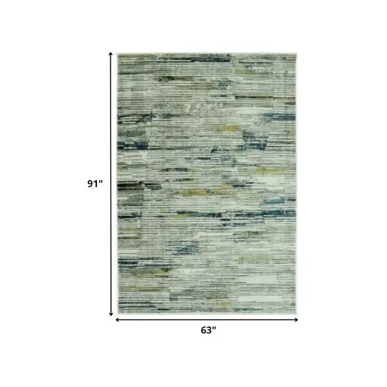 Ivory and Blue Abstract Area Rug Photo 3