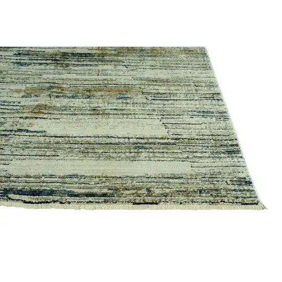 Ivory and Blue Abstract Area Rug Photo 3